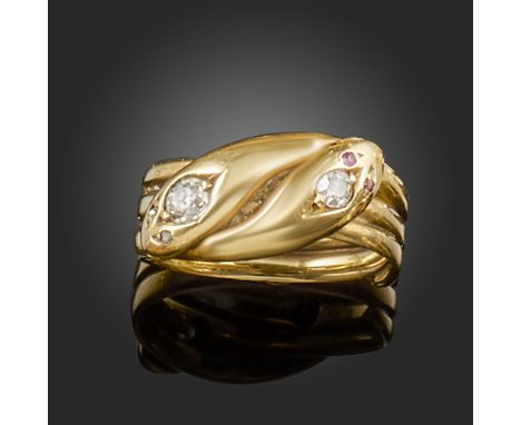 A late 19th century diamond-set gold snake ring, the crossover snake heads set with an old circular-cut diamond, with ruby or