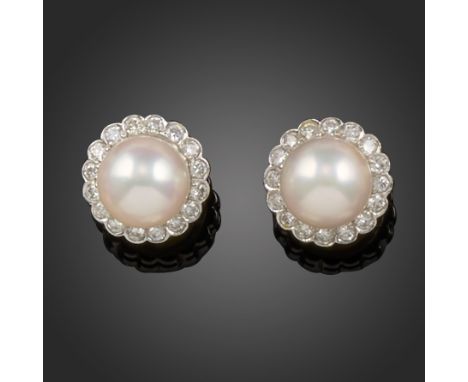 A pair of cultured pearl and diamond cluster earrings, the cultured pearls set within a surround of round brilliant-cut diamo