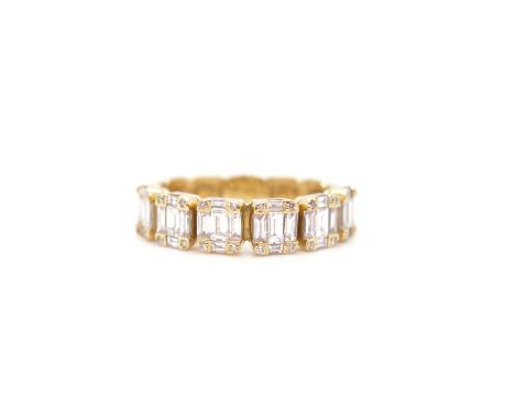 A diamond cluster eternity ring, set with clusters of baguette-shaped diamonds in gold, size K