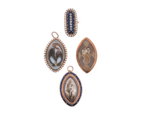 Three late 18th - early 19th century gold-cased navette-shaped lockets, each with glazed locket compartments containing hair 