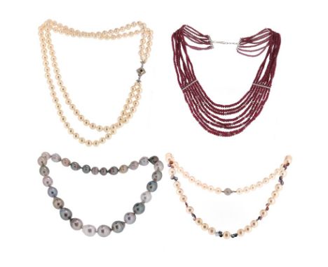 Four cultured pearl necklaces and a faceted ruby bead necklace