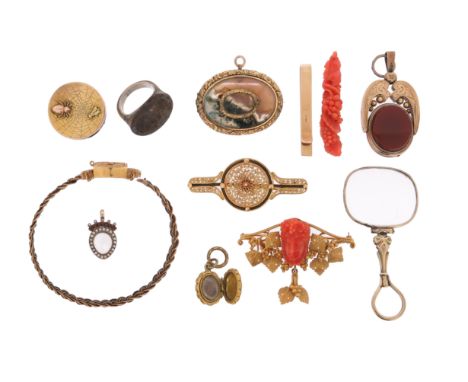 λ A small collection of mostly mid-late 19th century jewellery, including a brooch with carved coral head of a baccante, with