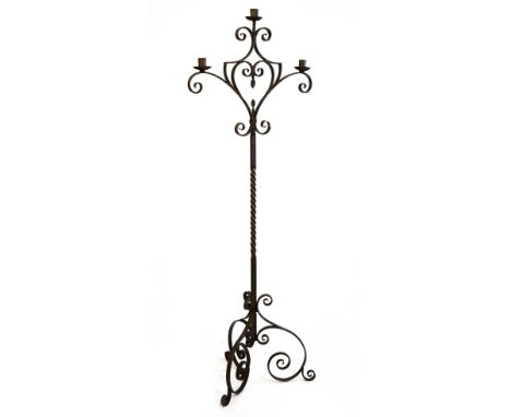 Wrought iron floor standing three-branch standard lamp, 168cm high   Condition: General wear including paint splashes, scuffs