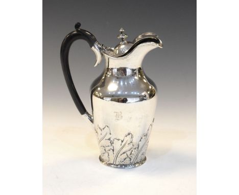 Victorian silver jug with embossed floral decoration and hinged cover, London 1891, 18.5cm tall, 390g approx gross   Conditio