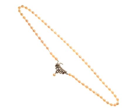 String of cultured pearls with Art Deco-style white metal clasp stamped 585, 51cm long   Condition: Possibly missing one pear