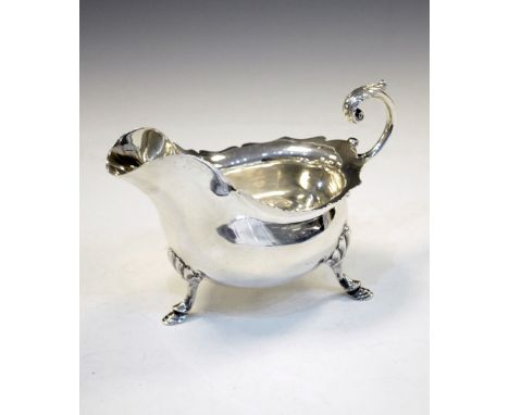 Edward VII silver sauce boat with shaped rim and standing on three hoof feet, Sheffield 1903, 200g approx   Condition: **Due 