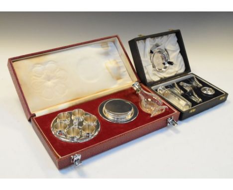 Two silver-plated Communion sets, both cased   Condition: Light scratches in places. **Due to current lockdown conditions, bi