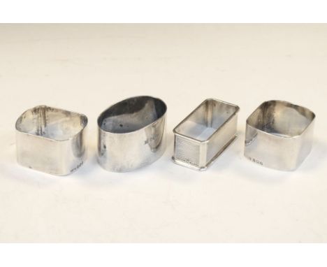 Pair of George V silver napkin rings, Birmingham 1926, together with two other napkin rings, 110g approx   Condition: Some li