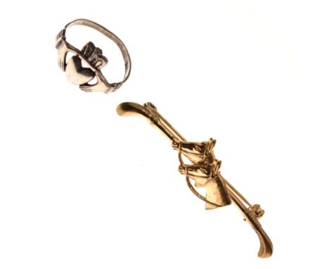 Unmarked gilt metal bar brooch formed as two horses heads and a riding crop, 4.8cm wide, together with an Irish silver 'Cladd