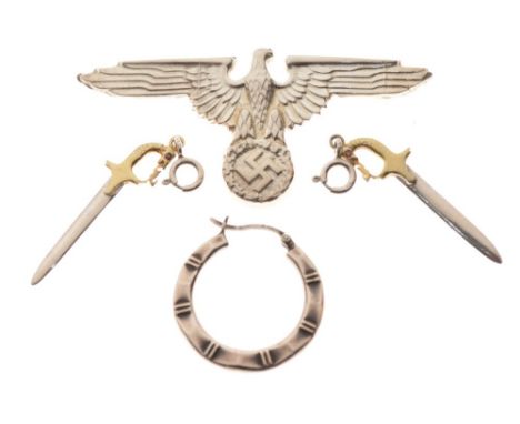 Third Reich-style unmarked metal cap or shoulder badge with eagle and swastika, pair of bayonet earrings stamped 925, and a h