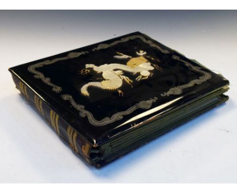Vintage Japanese lacquered photograph album having inlaid mother-of-pearl dragon design to cover   Condition: large section o