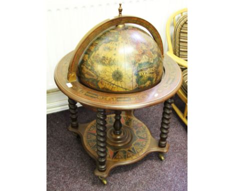 A reproduction wooden drinks globe.