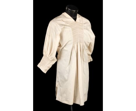 * A prize-winning traditional shepherd's smock, circa 1960, expertly stitched cream cotton smock (shown at the National Feder