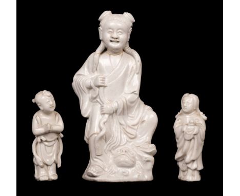 * A Chinese white glazed figure of Liu Haichan, 18th century, white porcelain figure depicting the Taoist legendary figure Li