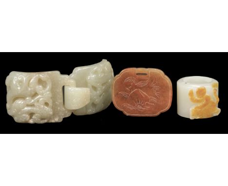 * Chinese Jade belt buckle, two parts carved with chilong, 11 cm long, together with a jade archers ring the flat face carved