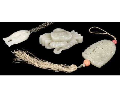 * Chinese jade carving of a crab, 6.5 cm long, together with a jade pendant, carved with an overall pierced design showing a 