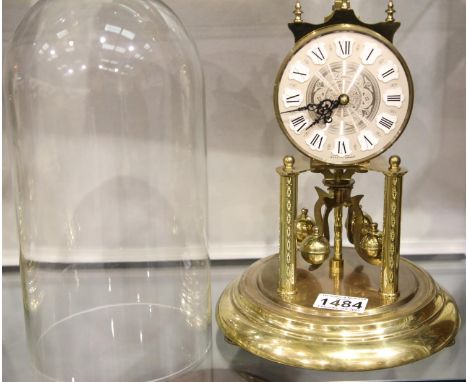 Glass domed brass anniversary clock by Kein, H: 28 cm, working at time of lotting. P&amp;P Group 3 (£25+VAT for the first lot