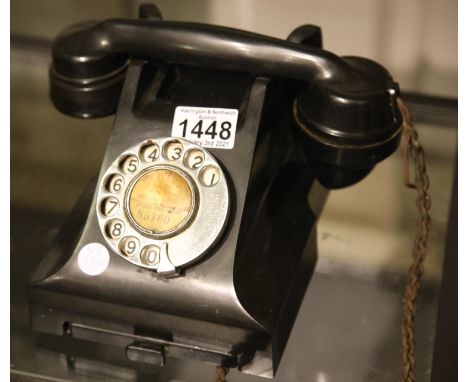 Black bakelite dial telephone. P&P Group 2 (£18+VAT for the first lot and £3+VAT for subsequent lots)Condition Report: Some u