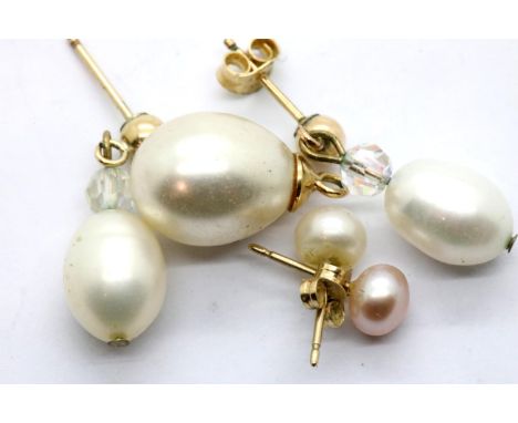 Two pairs of pearl mounted presumed gold studs and a yellow metal mounted pearl pendant. P&amp;P Group 1 (£14+VAT for the fir