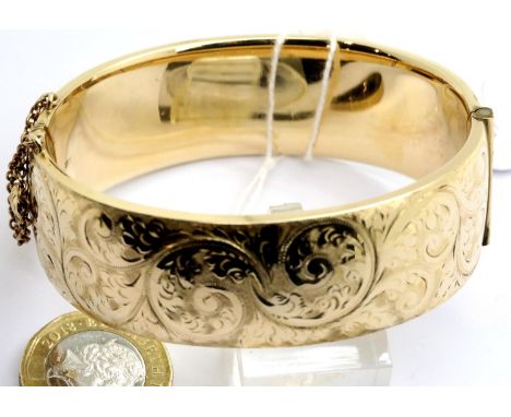 Metal core 1/5 9ct gold bangle, 54.2g. P&P Group 1 (£14+VAT for the first lot and £1+VAT for subsequent lots)Condition Report