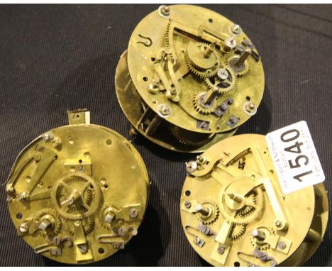 Three 19th century brass drum clock movements. P&amp;P Group 2 (£18+VAT for the first lot and £3+VAT for subsequent lots) 