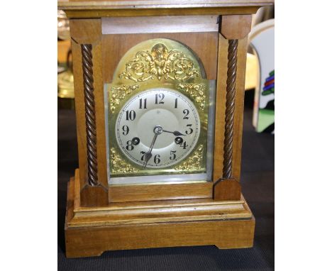 Walnut cased chiming mantel clock, with key, H: 34 cm, working at time of lotting. P&amp;P Group 3 (£25+VAT for the first lot