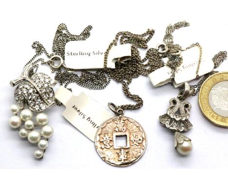 Three silver pendants on silver chains. P&amp;P Group 1 (£14+VAT for the first lot and £1+VAT for subsequent lots) 