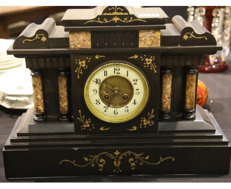 Victorian marble and slate cased pillared chiming mantel clock, H: 34 cm, working at time of lotting. Not available for in-ho