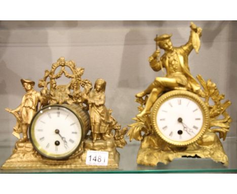 Two 19th century French cylinder mantel clocks, each lacking bases, the movements set into gilt metal figural surrounds, tall