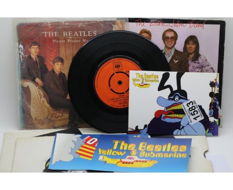 Collection of Beatles single records including a picture disc and a Bob Dylan single. P&amp;P Group 1 (£14+VAT for the first 