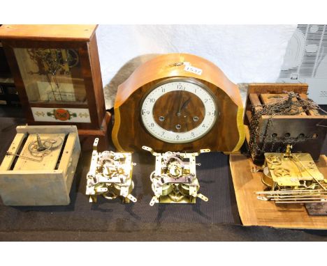 Two incomplete clocks and three movements. P&amp;P Group 3 (£25+VAT for the first lot and £5+VAT for subsequent lots) 