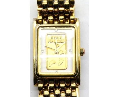 Ladies gold plated wristwatch with a 24 ct gold one gram plate to dial. Not working at lotting. P&amp;P Group 1 (£14+VAT for 