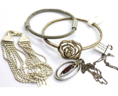 Three silver bracelets and a silver stone set pendant. P&amp;P Group 1 (£14+VAT for the first lot and £1+VAT for subsequent l