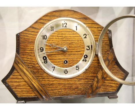 Oak cased Westminster chiming mantel clock, H: 26 cm, working at time of lotting. Not available for in-house P&amp;P, contact