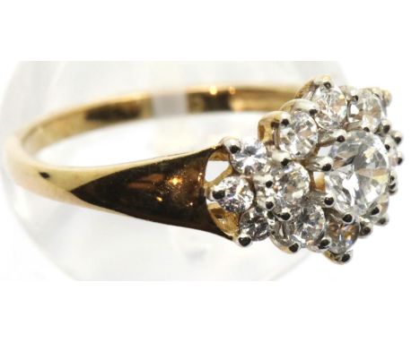 9ct yellow gold cubic zirconia set flower head ring, size N, 2.4g. P&amp;P Group 1 (£14+VAT for the first lot and £1+VAT for 