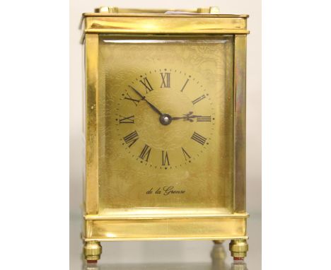 Brass carriage clock dial marked de la grense, lacking key, one glass panel is present but separate, working at time of lotti