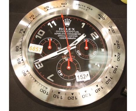 Dealers point of sale wall clock, Oyster Perpetual Cosmograph with black face, silver bezel and sweeping seconds hand. P&amp;