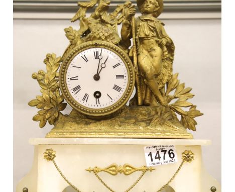 19th century French cylinder mantel clock, the movement set into a gilt metal figural surround and raised on an alabaster bas