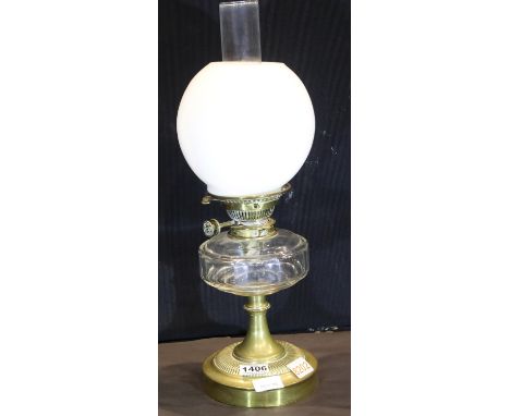Victorian brass based oil lamp with glass reservoir and milk glass shade, H: 50 cm. Not available for in-house P&amp;P, conta