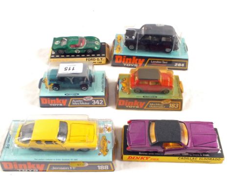 Hanging packs of Dinky models, 175 Cadillac El Dorado purple body, 183 Mini Minor red body, 284 London taxi, 188 Jensen FF, 3