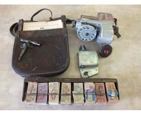 Various bus conductors equipment including ticket machine, bell punch and clip of unused tickets etc