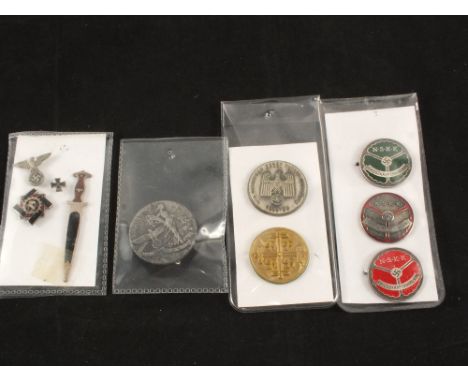 Six German (PATTERN) badges with four tie pins including an N.S.K.K. dagger example