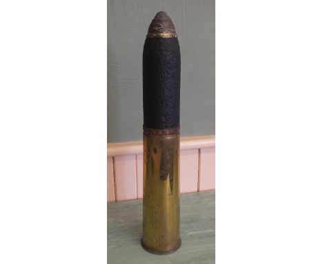 An 18 pdr shell case with head and timer