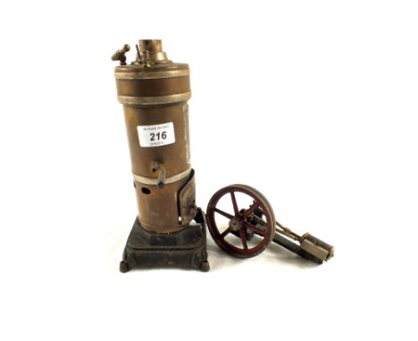 A Brass vertical steam engine and a flywheel accessory (no burner)