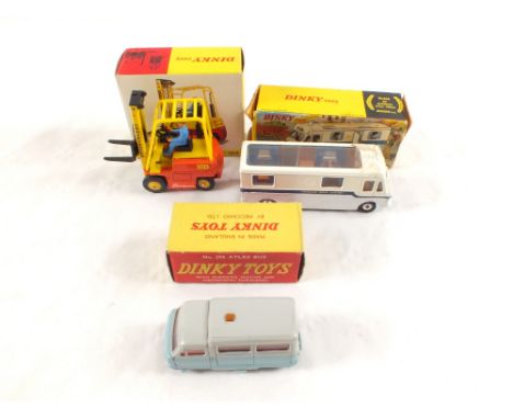 Boxed Dinky models, 404 Climax fork lift, 280 Midland mobile bank and 295 Atlas bus