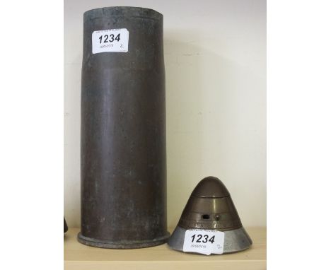 A 76mm shell case with a shell head timer
