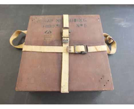 A pre-WWII gap measuring device with built in wooden case and tripod, complete with webbing straps 
