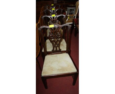 A set of four circa 1900 mahogany Chippendale style dining chairs