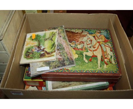 One box containing a small quantity of various jigsaws and games to include 2x made wooden jigsaws, Post Office boxed set, pl
