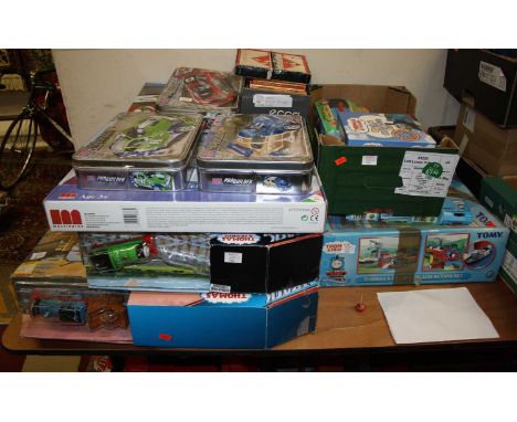 A large quantity of Thomas the Tank Engine locomotives, train sets, books, and 3 Pro-Builder Mega Blok sets etc